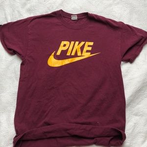 Maroon PIKE shirt with a Nike swoosh